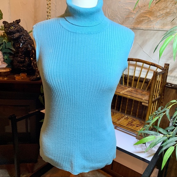 light blue sleeveless turtleneck